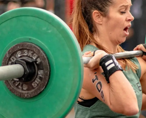 Woman lifting a barbell overhead