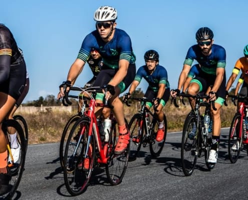 Cyclists in competition on open road