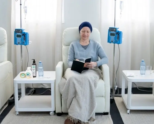 3 women receiving chemotherapy in a hospital